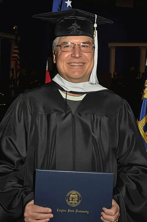 Paul Gjenvick in Masters' Robe at Clayton State University Graduation Ceremony, 2012.