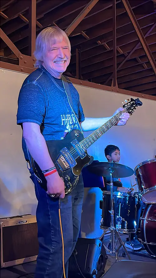 Paul Still Plays Today, an Alumnus of the School of Rock and the Wauwatosa School of Music, Is Shown Here Playing at a Concert in January 2025.