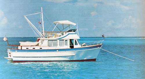 The De Fever Passagemaker 40 Trawler / Cruiser Anchored in Calm Waters.