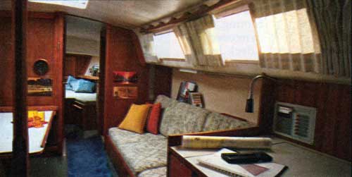 GGA Image ID # 239ebdcace CAL 34-111 Belowdecks: The Traditional Teak-Paneled Cabin of a Classic Offshore Cruiser.