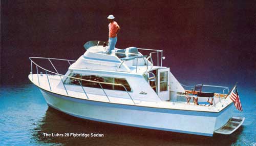 GGA Image ID # 23d6338540 The Luhrs 28 Flybridge Sedan Cruiser Shown in Calm Waters.