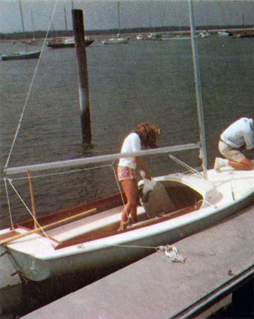 A Young Couple Docking an O'Day Ospray Sailboat.