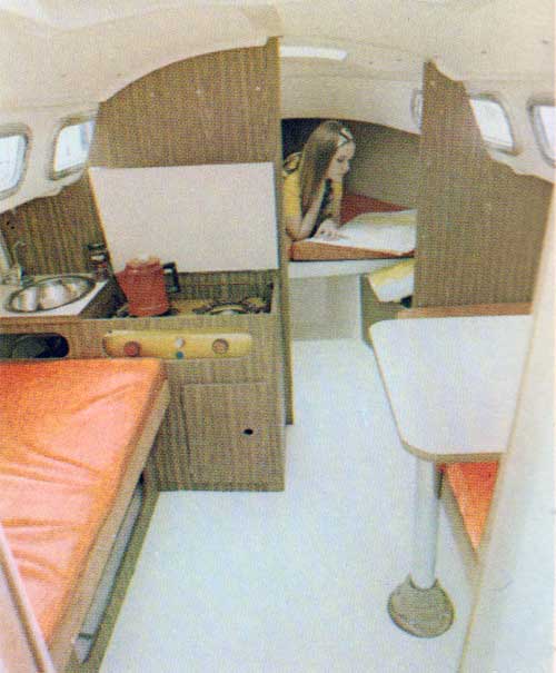 Interior View of the O'Day 22 Showing a Young Girl Studying in the Foreward Cabin.