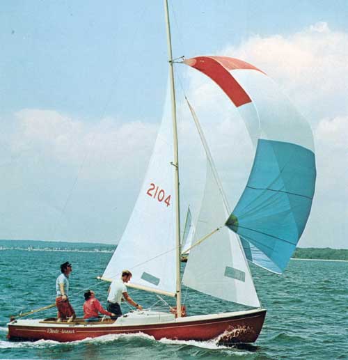 GGA Image ID # 23f6257829 Youngsters Crusing on a Rhodes 19 Sailing near the Shoreline.