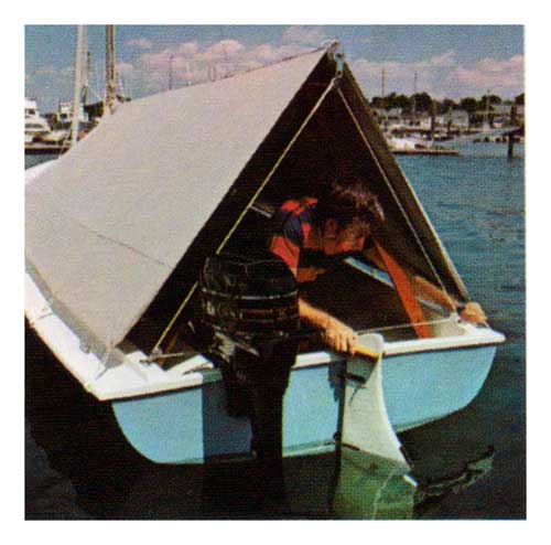 Man adjusts Centerboard on O'Day Day Sailer II.