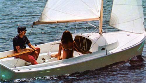 Young Couple Enjoy a Relaxing Cruise on Day Sailer II by O'Day.