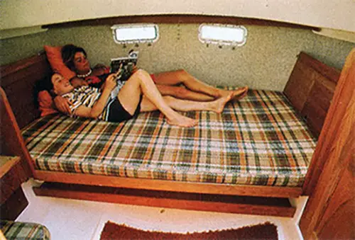 GGA Image ID # 24037124b1 Girls Relaxing in the Spacious Cabin on the O'Day 32 Aft-Cabin.