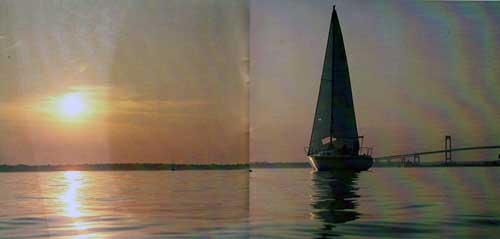 GGA Image ID # 30ec8jn156 An O’day Yacht Anchored in Calm Waters at Sunset.