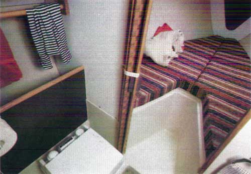 The Fully Enclosed Head Incorporates a Sink, Vanity and a Hanging Locker for Those Going-Ashore Clothes. a Shower Is Optional on the O’day 27 Yacht.