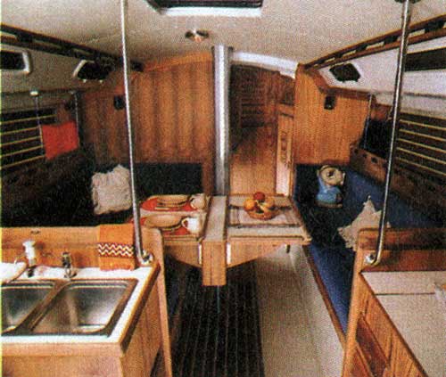 GGA Image ID # 305x25yupt Main Cabin on the O'Day 39 Showing Portions of the Galley and Center Table.