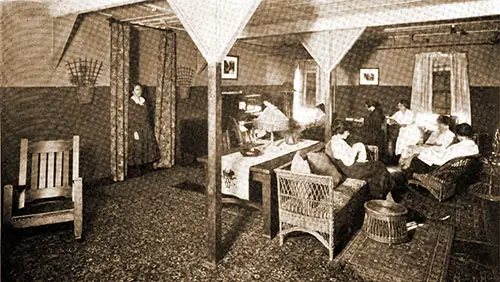 GGA Image ID # 19263ac40c "Off Duty" Girls, Caught by the Camera, Enjoying a Social Hour in the Living Room of Their Home in Camp.
