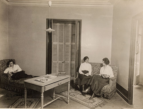 Hello Girls Relax in Rest Room. Left to Right: Misses Anderson,; Chief Operator Vannier. Signal Corps. Base Section #1. St. Nazaire, Loire-Inferieure, France.