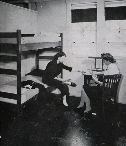 Quarterdeck Takes the Barracks’ Business in Its Stride. Cubicle . . . Planned for Living! . . . Enjoying! . . . Relaxing!
