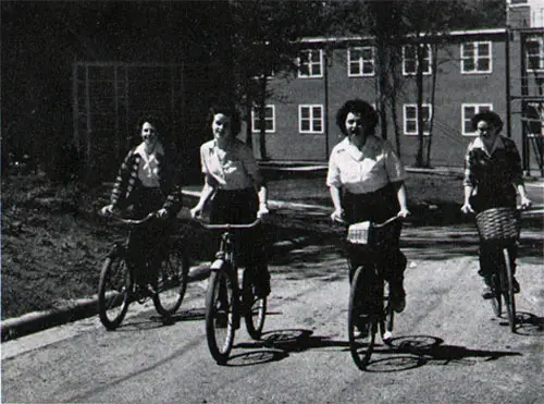 Cyclists Breathe the Freshness of Morning Air As They Start a Recreation-Sponsored Jaunt to the Hills.