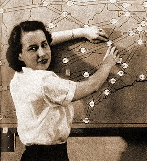 Fair Weather “Man." This Seaman From Florida Loves Her Job at the Naval Air Station at Anacostia. She Checks the Weatherboard, Indicating Flying Conditions Nationwide at Navy Fields. Wave Weather Girl at Anacostia Nas.