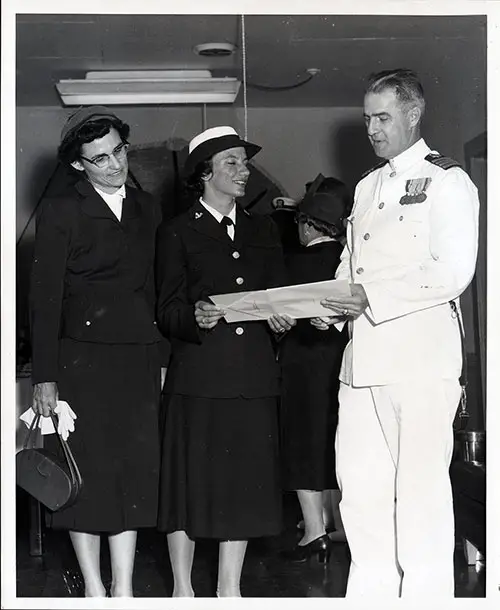 Capitolie A. Sutton, SR, Co. 1955-18(W) Receiving Honor Certificate.