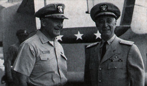Vice Admiral C. T. Booth is Welcomed Aboard the USS America by Rear Admiral James O. Cobb.