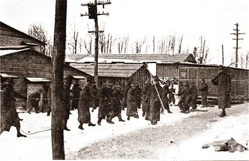 GGA Image ID # 18ef10b7c7 Men From the 304th Infantry Moving a Building Formerly Used as Sleeping Quarters for Civilian Workmen.