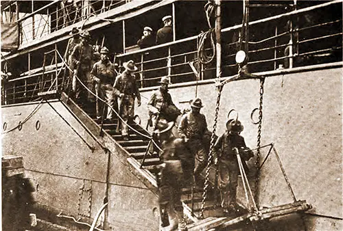 GGA Image ID # 18aab27566 Marines Disembarking at French Port Direct by Gangway onto Dock.
