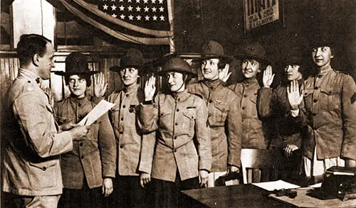 GGA Image ID # 19753e7639 Dressed in Men's Uniforms, (l to R) Violet Van Wagner, Marie Schlight, Florence Wiedinger, Isabelle Balfour, Janet Kurgan, Edith Barton, and Helen Dupont Are Sworn in as Privates at New York.