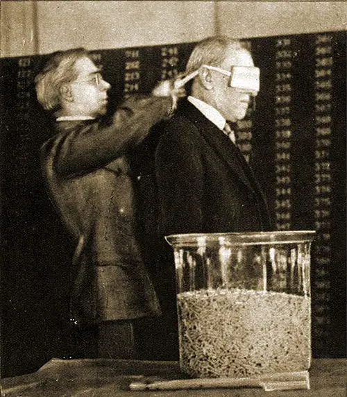 GGA Image ID # 1957a8ce26 President Wilson Being Blindfolded Preparatory to Drawing the First Capsule from the Bowl