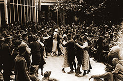 YMCA hostesses and Signal Corps personnel dance to relieve wartime tension, 1918.