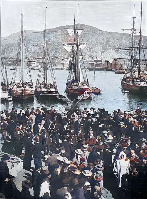 A Band Concert at the Pier at Hammerfest Harbor draws a large crowd. (HAPAG Nordland-Fahrten, 1908)
