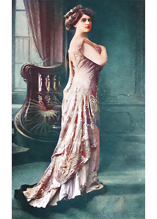 Handsome Evening Gown of Yellow Broché Silk With Tunic of Embroidered Lace, Showing the Tendency to Flowing Drapery.