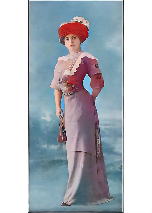Street Costume of Cherry Silk Crepon With Embroideries in Cherry and Gold, and Naval Arrangement of Crepon Buttons Framed in Black Velvet.