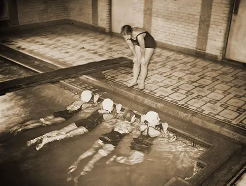 GGA Image ID # 22285d1751 A National Youth Administration Worker Teaches a Swim Class, c. 1940.