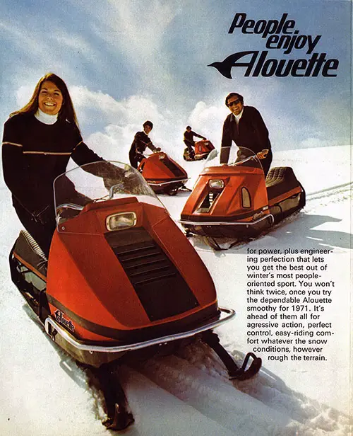 Family Snowmobiles through the hills on Alouette.