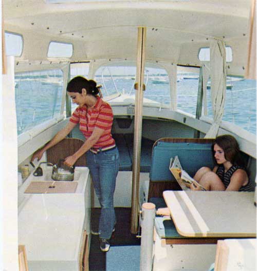 Women making tea in the galley of the O'Day 23