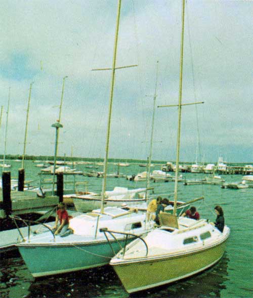 O'Day 23 at Sea, at the Marina and a view of the inner compartment