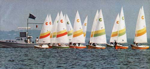 A Fleet of O'Day 12's Cruises the Starting Line