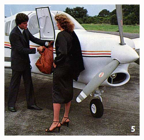 Front and aft compartments give you almost 25 cubic feet of luggage space. - 1980 Brochure