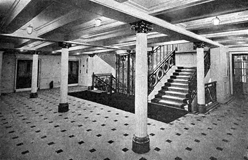 Spacious Companionway of the RMS Lusitania Showing Elevators.