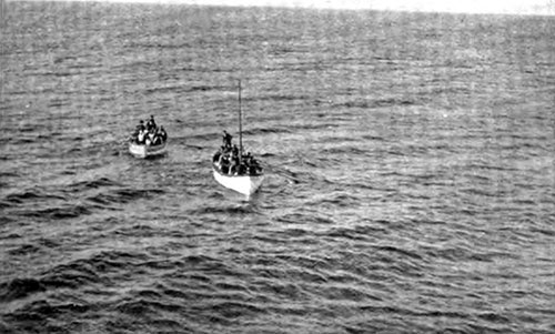 Fifth Officer Lowe Towing Canvas Collapsible Lifeboat Towards the Carpathia. 