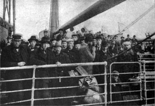 Photo 01 - Immigrants On Deck - Just Before Landing In The United States