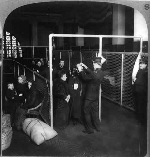 Inspecting the eyes of immigrants at Ellis Island