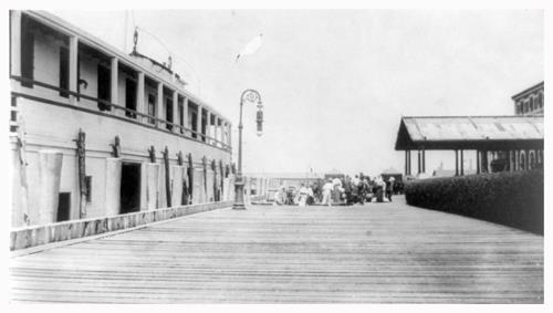 Ellis Island Dock with Immigrants in Background