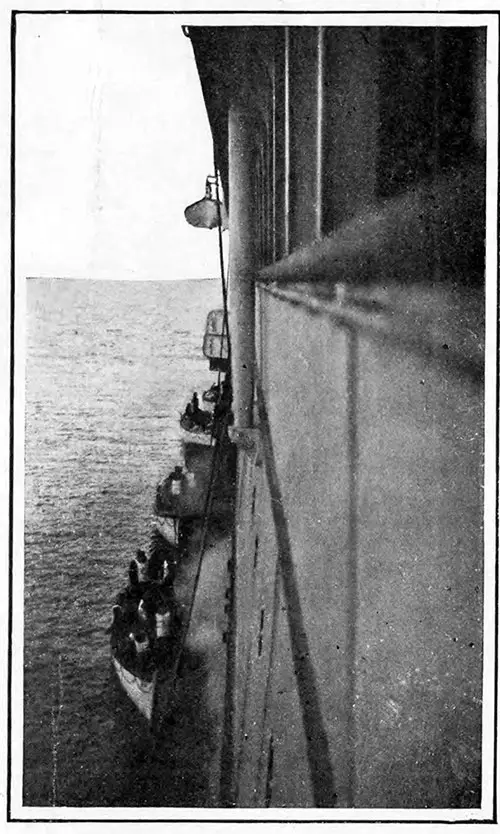 Four Boat-Loads of the Titanic’s Passengers at the Carpathia’s Side.