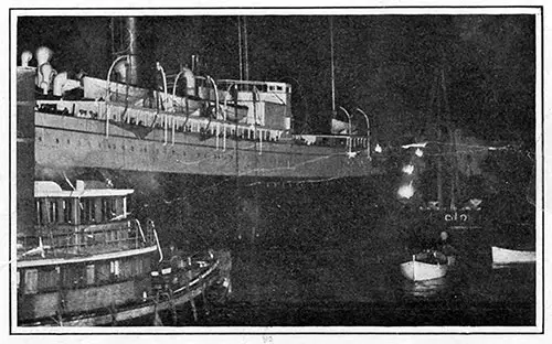 The Carpathia Docking, with Two of the Titanic's Lifeboats in the Foreground.