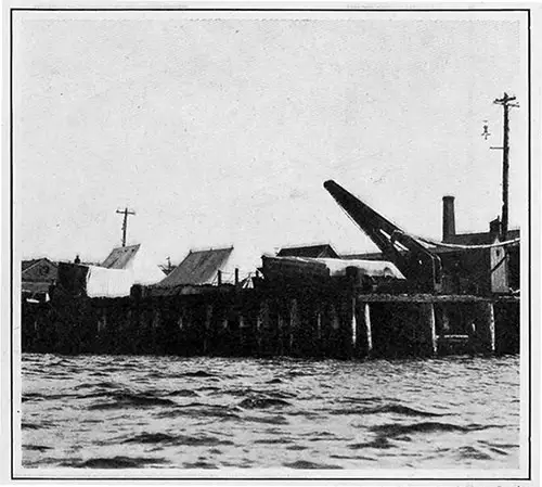 Tents Used as a Temporary Morgue for the Reception of the Bodies on the Pier.