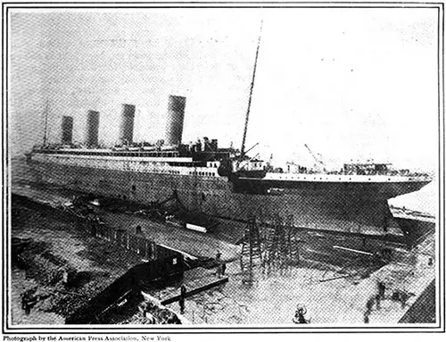 The RMS Titanic as She Lay in Belfast Harbor After Launching. The First Photograph Taken of the Great Liner.
