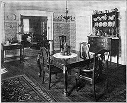 Dining Room with Elaborate Wall Paper