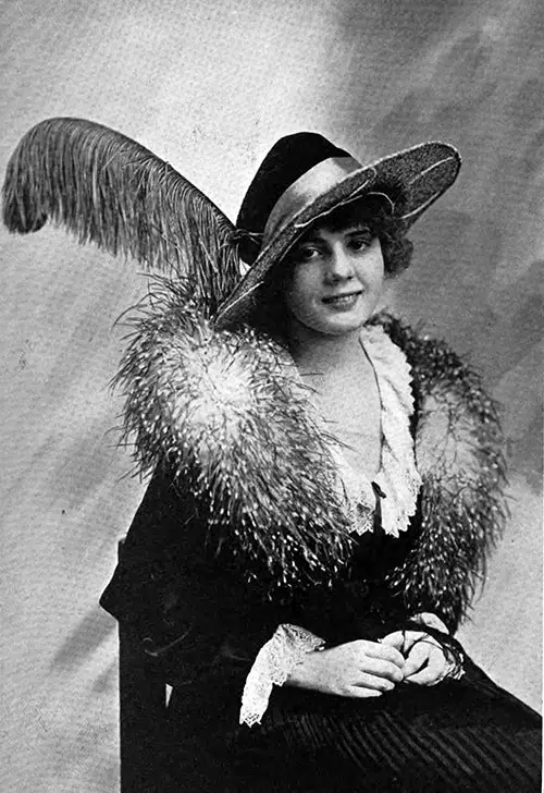 Restaurant Hat with Gold Lace Brim Wired in a Novel Way. From the New York Showroom of The Hart & Co., Cleveland.