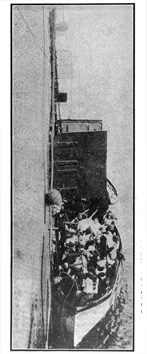 Survivors in One of the Lifeboats At the Side of the Carpathia.