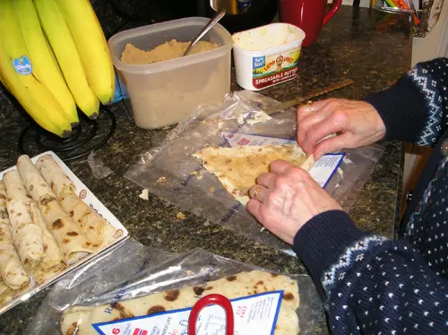 Step 3: Rolling the Lefse With the Layer of Butter and Brown Sugar.