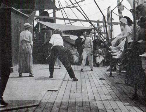 A Few of the Refugess Enjoying a Game of Deck Tennis 