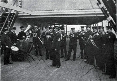 The Ship's Band Playing On Deck During A Performance At Sea